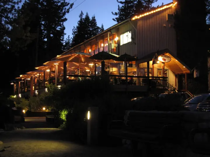 The restaurant and deck lit up after dark