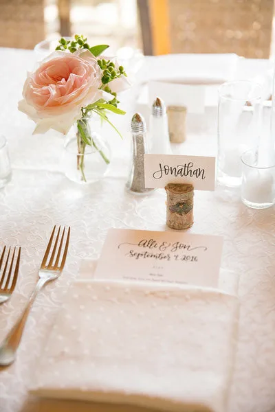 A place setting with menu card